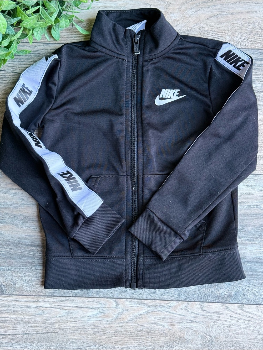 Nike Kids Black Track Jacket with White Logo Tape